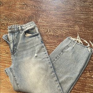 Light Blue Distressed Boyfriend Jeans with Fading